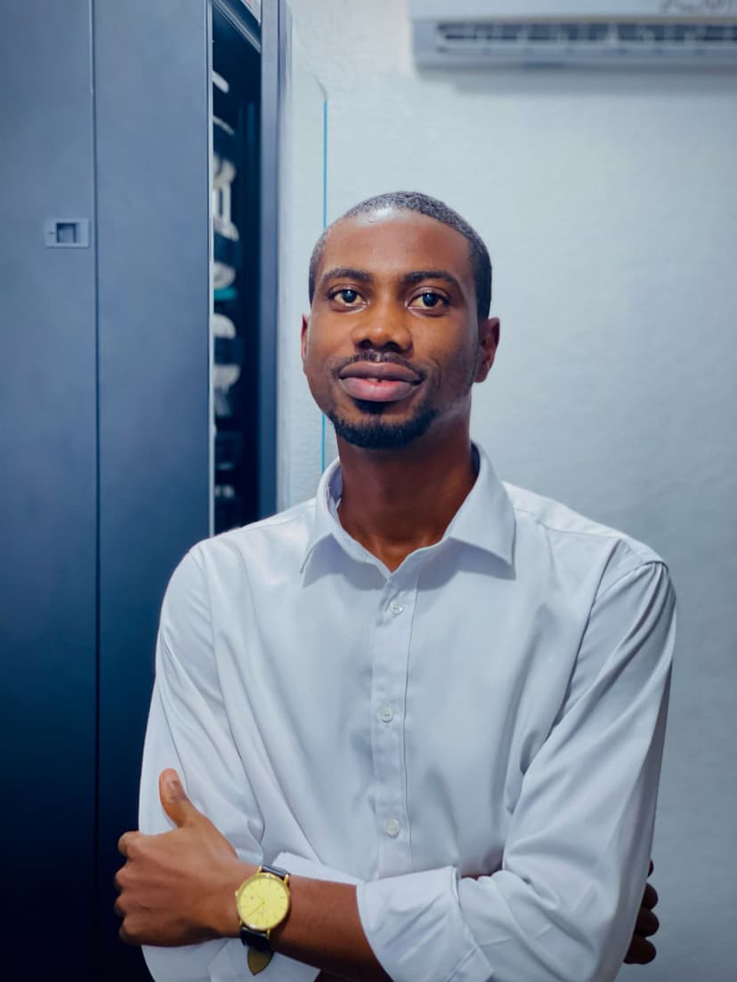 Professional headshot of Benjamin Aduo.